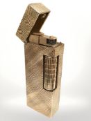 A Dunhill 9ct yellow gold cigarette lighter, London 1963, gross 105.6g, 65 mm x 25 mm x 13 mm.