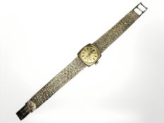 A lady's 9ct gold Eterna wristwatch on 9ct gold integral strap CONDITION REPORT: 18.