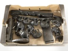 A group of African carved ebony elephants.