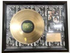 A The Beatles Let it Be limited edition vinyl disc, numbered 89 of 1500, in frame, 45 cm x 58 cm.