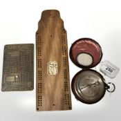 A brass cased pocket compass in original fitted case, the silvered dial signed 'Newman & Son,