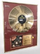 A The Beatles Rubber Soul gold plated limited edition vinyl disc, in frame, 51 cm x 41 cm.