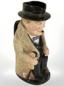 A Royal Doulton Toby jug of Sir Winston Churchill.