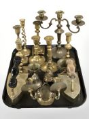 Various brass candlesticks, candelabrum, irons, wall sconce, bells, etc.