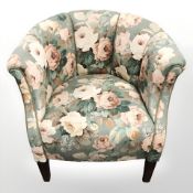 A 20th century armchair in floral fabric