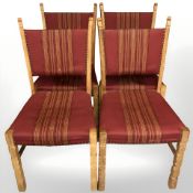 A set of four Danish blonde oak dining chairs, plus two ebonised wheelback chairs.