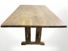 A stained pine refectory dining table, 170 cm L x 98 cm W x 74 cm H.