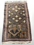 An unusual Afghan rug of asymmetrical design,