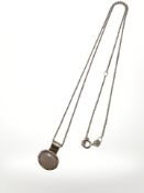 A 9ct white gold synthetic opal pendant on 9ct white gold chain