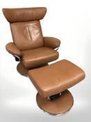 An Ekornes Stressless stitched tan leather and chrome swivel armchair, and matching footstool,