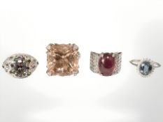 Four Sterling silver dress rings