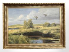 Carl Hoyrup (Danish, 1893 - 1961) : Ducks Coming Into a Pond with Marshland Beyond, oil on canvas,