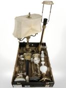 A group of brass and ceramic lamp bases.