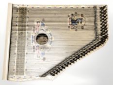 A harp labelled Mandolin Harp made in Saxony,