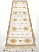 A flatweave Kilim runner, 260 cm x 82 cm.