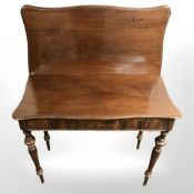 An early 20th century serpentine front turnover top tea table,