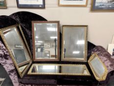 Five contemporary gilt framed mirrors, largest 64 cm x 94 cm.
