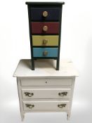 An early 20th century painted three drawer chest, width 65 cm, and a further four drawer chest.