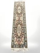 A Tabriz-design runner,