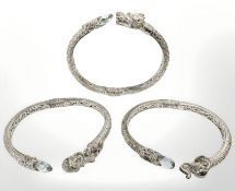 Three decorative silver expansion bangles, stamped .925. CONDITION REPORT: 84.7g.