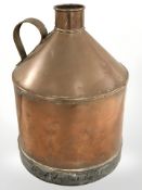 A 19th century copper flagon, height 35 cm.