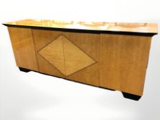 An Art Deco style lacquered sideboard, 200 cm L x 50 cm D x 80 cm H.