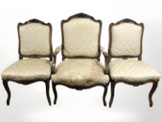 A set of three continental walnut salon chairs.