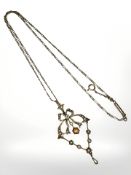 An Edwardian 9ct gold seed pearl and citrine pendant on chain CONDITION REPORT: 4.