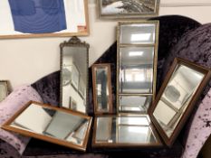 Six antique and later mirrors, largest 47 cm x 111 cm.