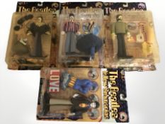 Four McFarlane Toys The Beatles Yellow Submarine figurines, in original packaging.