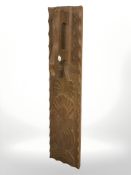 A Scandinavian carved teak mangleboard, with horse handle, length 63 cm.