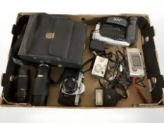 A Pentax KX camera, JVC video camera, lenses, etc.