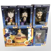 Four Titans The Beatles vinyl figurines, in boxes,