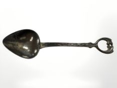 An Arts and Crafts silver preserve spoon, Albert Edward Jones, Birmingham 1912.
