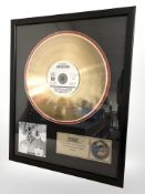 A The Beatles Revolver limited edition vinyl disc, numbered 22 of 100, in frame, 54 cm x 44 cm.