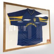 A signed Leeds United football shirt, includes ticket stub of Sunderland v Leeds United, 26/12/2002.