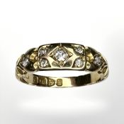 An 18ct gold diamond ring, size M½ CONDITION REPORT: 2.