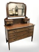 A late Victorian mahogany and satinwood inlaid dressing chest, 106 cm W x 48 cm D x 154 cm H.