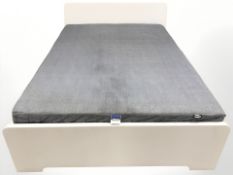 An IKEA double bed frame with interior.