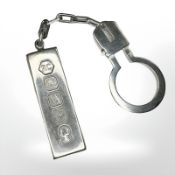 A silver ingot keychain fob, Carr's of Sheffield Ltd, London 1977,
