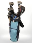 A golf bag containing left-handed irons and drivers : Ping,