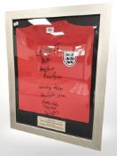 A replica of the England 1966 World Cup football shirt, with facsimile signatures.