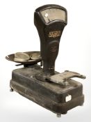 A set of Avery enamelled grocer's scales with weights
