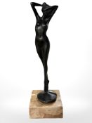An Italian bronze figure of a standing nude female, signed G Mariani, on peach marble plinth,