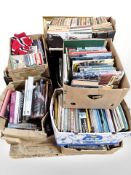 A very large quantity of volumes, Penguin books, some relating to trains, railways, music,