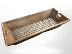 A 19th century rustic pine rectangular twin handled trough, length 90 cm.