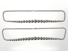 A pair of graduated Sterling silver ball-link necklaces,