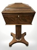 A William IV mahogany sarcophagus work box with lined interior,