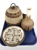 A Scandinavian earthenware lamp base, pendant light fitting and a shallow dish.