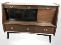 A 20th century G Plan teak and ebonised sideboard designed by E.